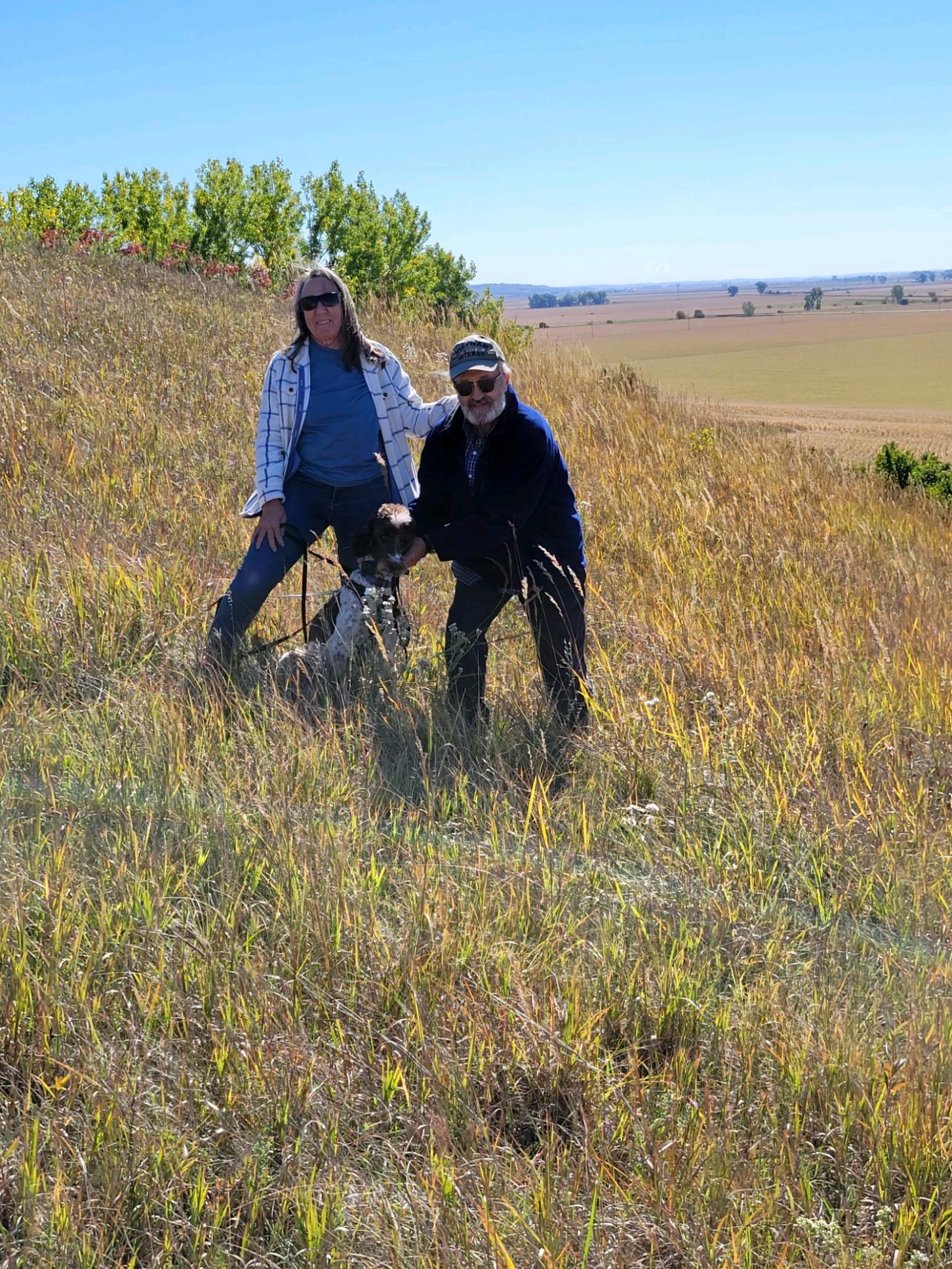 Scott and Sandra Wendel with their dog at Wendel Prairie Preserve